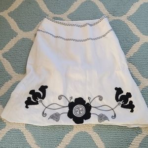 White with black floral detail knee length skirt